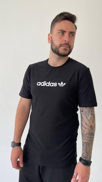 Чорна чоловіча бавовняна футболка Adidas літня з вишитим логотипом та округлим вирізом для спорту та міського життя 269 фото